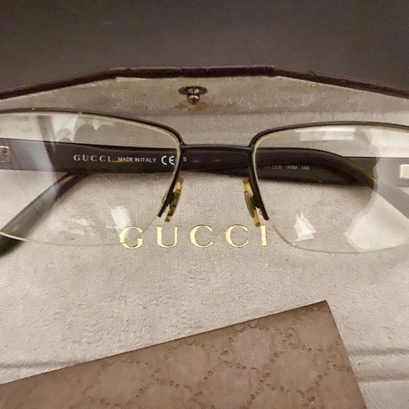Gucci Gold and Black Rimless Eyewear - Picture 1 of 3